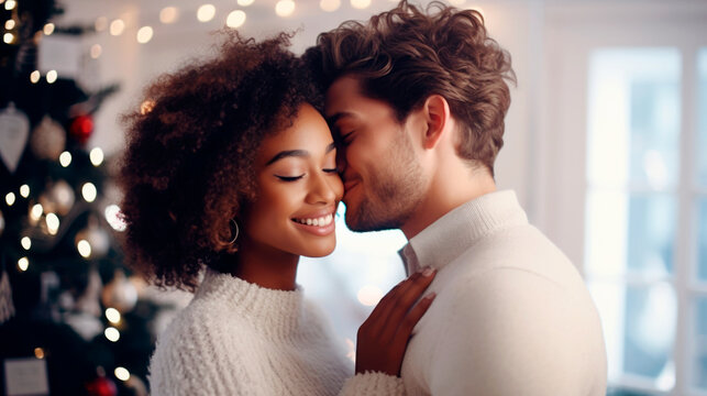 Happy young interracial married couple at christmas celebration. Christmas tree with a luminous garland in the background. Ai generated - Powered by Adobe