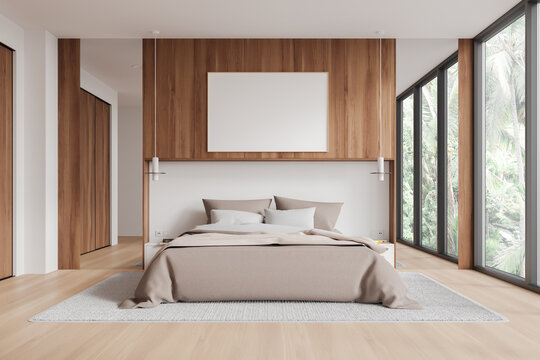 White and wooden bedroom interior with poster