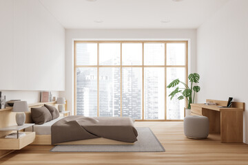 Fototapeta na wymiar Stylish home bedroom interior with bed and workspace, panoramic window