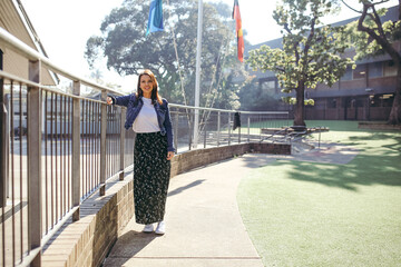 First Nations public school teacher smiling at the camera