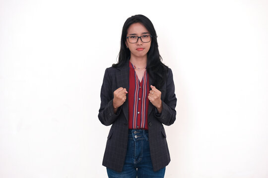 Facial expression of an Asian business woman standing with full confidence