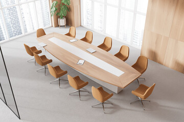 Top view of conference room interior with board and chairs, panoramic window