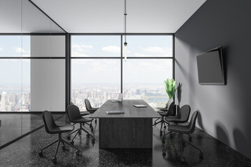 Grey business room interior with meeting table and seats, panoramic window