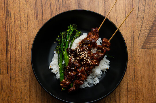 Venison / Beef Bbq skewers on rice with broccolini
