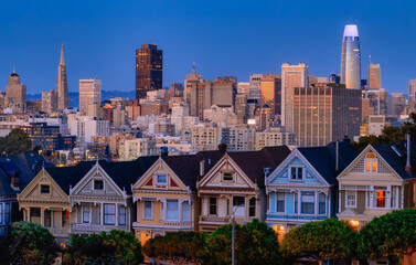 Evening, Painted Ladies Victorian houses in Alamo Square and a view of the San Francisco skyline...