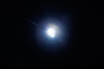 Easy to add lens flare effects for overlay designs or screen blending mode to make high-quality images. Abstract sun burst, digital flare, iridescent glare over black background.