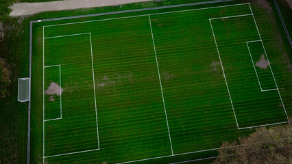 Football field. Training center in forest - 665455063