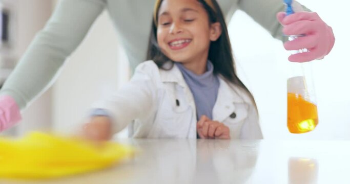 Father, kid and spray kitchen table, cleaning and hygiene, disinfect or health at home, smile and bonding. Hands, child and wipe counter with cloth, help and teaching, learning and happy together