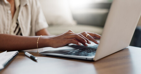 Desk, hands typing and laptop in home for remote work, internet search or blog. Closeup, computer and woman on keyboard at table in living room, writing email and communication on digital technology - Powered by Adobe