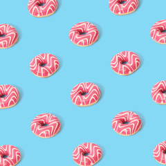 Donuts on blue background. Top view. Pop art design.