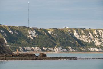 View of the sea, coastline and the East Cliff of Folkestone, England