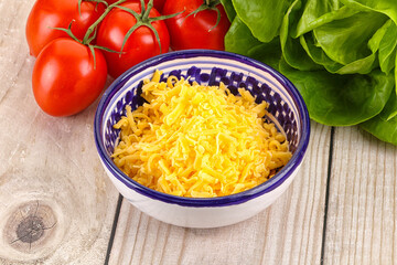 Shredded cheese in the bowl