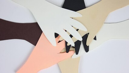 A lot of people put their hand together. Unity concept close up. United team idea. Anti racism sign. Group diverse arm on top of each other. Racial love symbol. Many different multi ethnic. Mixed race
