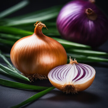 Dos cebollas y una mitad de otra entre hojas