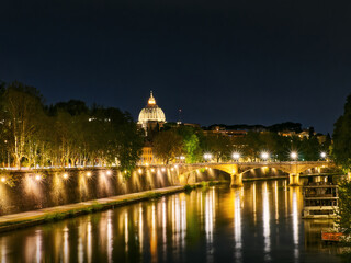 Fototapeta na wymiar Idyllic tiber river night landscape reflections church dome, Rome, Italy