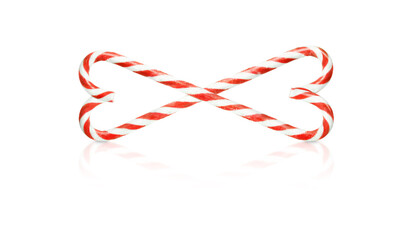 Fototapeta premium Christmas candy canes weave in hearts isolated