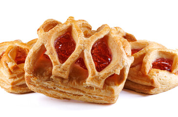 Puff pastry pastry with lingonberry jam on a white background. Cookies with lingonberry jam.