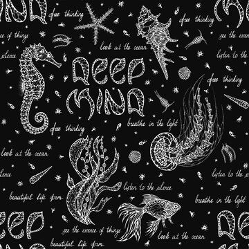 Seamless graphic monochrome pattern composed of drawn seahorse, fish, jellyfish, plankton, algae, starfish and shells isolated on a black background. It also contains the inscription DEEP MIND