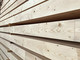stack of Engineered wood timber beams. Mass Timber glulam construction material
