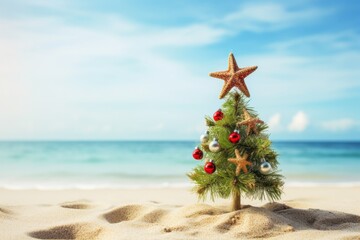 Christmas tree decorated on the sandy beach