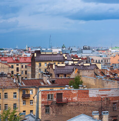 Fototapeta na wymiar top view of the city roofs in the historical center of Saint Petersburg
