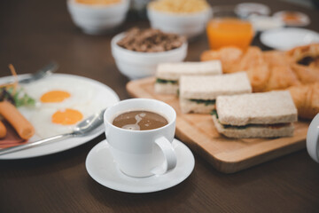 Fresh and bright continental breakfast healthy, Breakfast served food with beverage coffee, orange juice on table in the morning at home