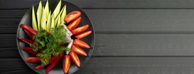 Türaufkleber Platter of assorted fresh vegetables on black background. Banner. © mtrlin