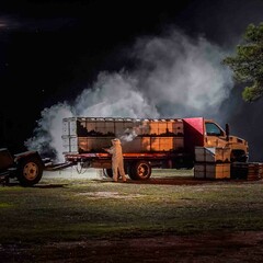 Nighttime beekeeping in action: Maintaining bee health and sustainability through careful hive...
