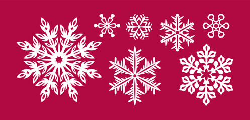 Obraz na płótnie Canvas Snowflakes templates for laser cutting. Beautiful snowflakes of different shapes and sizes. Winter decorations.