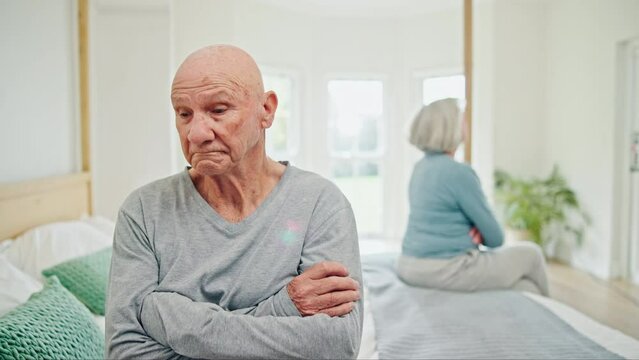 Senior couple, breakup and fight on bed in conflict, disagreement or dispute at home. Frustrated elderly man in cheating affair, divorce or disappointment in bedroom argument or toxic relationship