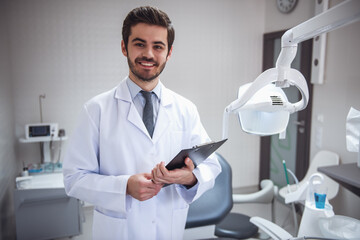 Handsome young dentist