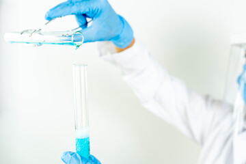 Female researcher examining medical sample