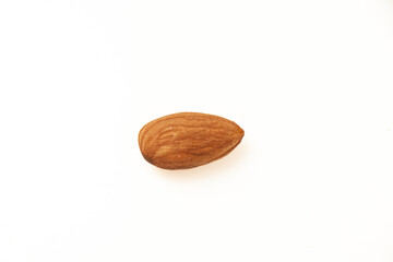 Seed of Almond baked on white background.