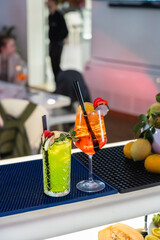 Assortment fresh cocktails on the bar counter.