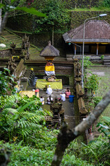 A small temple used for holy ablutions. Haunted and covered in moss, with offerings, beautiful...