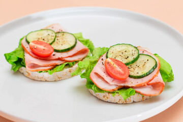 Light Breakfast. Quick and Healthy Sandwiches. Rice Cakes with Ham, Tomato, Fresh Cucumber and...