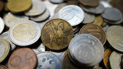 Coins from different countries of the world. Polish Zloty, Czech Crowns, Euro, Russian Ruble