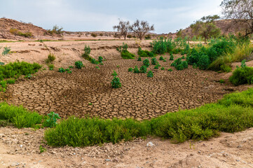A view down the dried up Agab river bed at Oruhito in Namibia during the dry season