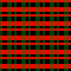 Christmas and New Year tartan plaid. Scottish pattern in black, red and green cage. Scottish cage. Traditional Scottish checkered background. Seamless fabric texture. 