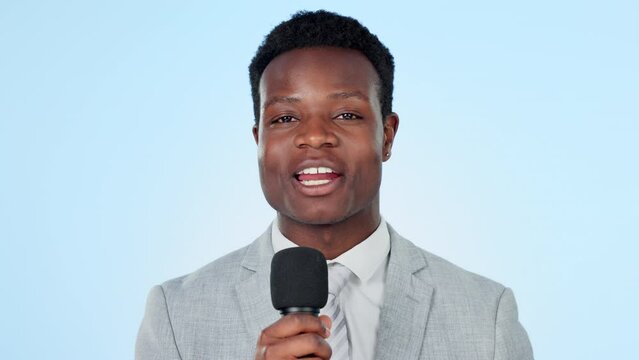 Reporter, microphone and face of black man in studio for news, broadcast or live streaming on blue background. Hosting, speech and portrait of male journalist presenting media, information or tv show