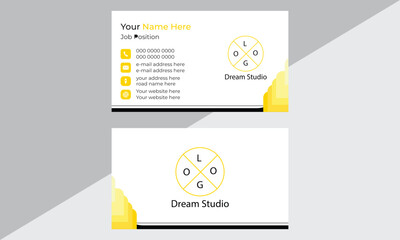A modern and creative business card design set with geometric shapes.