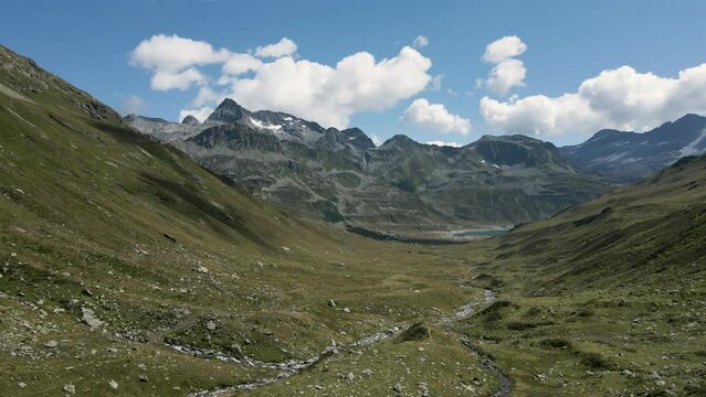 Panoramic aerial view of Val Loga - View on Montespluga Lake Town and Pizzo Suretta