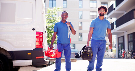 Maintenance Workers Near Van Or Truck © Andrey Popov
