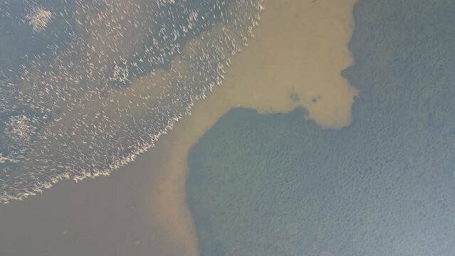 An aerial view of Clonbur from a distance showcasing the texture and patterns of Galway County, Ireland