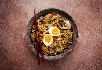 buckwheat noodles, soba, with shimeji mushrooms, boiled egg, green onion, sesame seeds, homemade, no people,