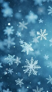 Flocons de neige &eacute;toil&eacute;s qui tombent sur fond bleu