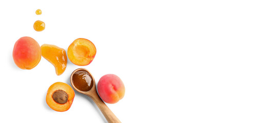 Spoon with sweet jam and apricots on white background with space for text, top view