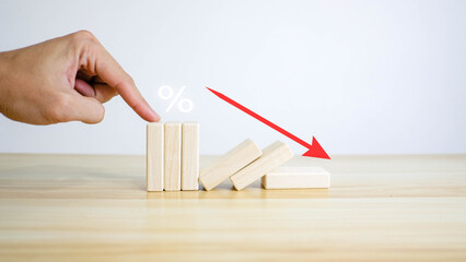 Interest rate and mortgage concepts Wooden block with percentage icon symbol and arrow pointing up The economy is getting rather worse. - obrazy, fototapety, plakaty