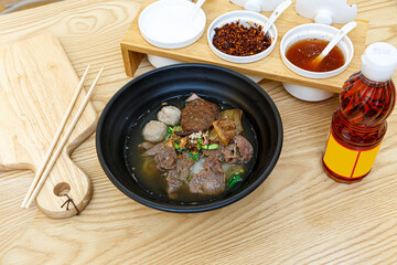 Braised Beef Noodles, Thai food with side dishes on the table