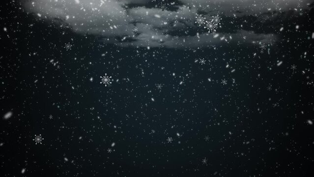 Snowy night before Christmas - Clouds against a dark sky and snow